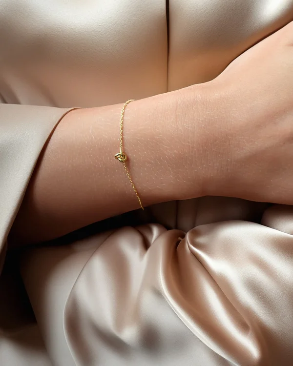 Le Knot drop bracelet gold